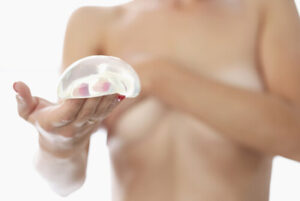 problems with breast implants under the muscle check